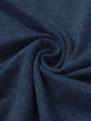 Close-up fabric detail of skin-friendly long sleeve melange polo, soft blend texture with cobalt heather tone