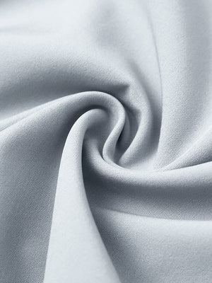 Fabric close-up of traditional breathable solid shirt, soft weave with airy glacier grey finish