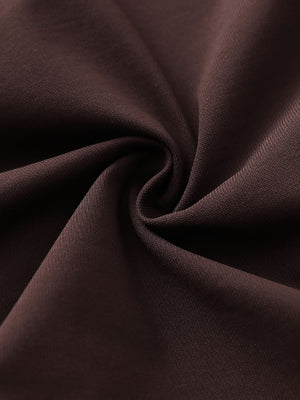 Fabric detail of Stretch plain everyday pants with smooth stretch and dark brown tone