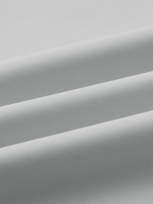 Close-up of fabric on water repellent 8 pockets pants, showing texture and finish in light grey