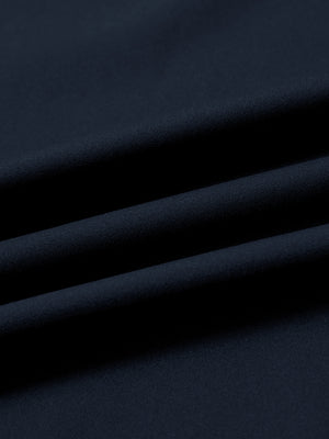 Fabric close-up of print collar quarter zip golf vest, smooth material with subtle texture in navy