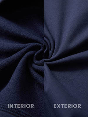 Inside and outer fabric close-up of navy youth winter micro-fleece quarter zip pullover, soft fleece.