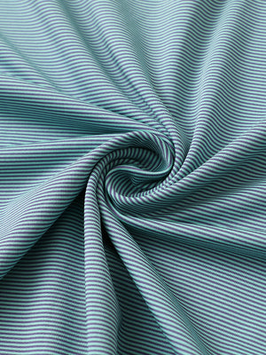 Fabric close-up of pinstripe jersey performance polo, fine stripe pattern with breathable green ash stripe finish