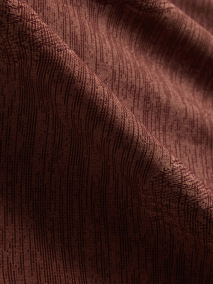 Close-up of red flower breathable jacquard pattern 3-button golf polo fabric texture