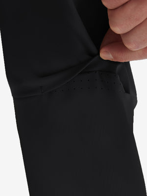 Detail view of design on black flat front golf joggers pants with belt loops