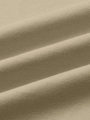 Close-up of fabric on 2 in 1 running sports shorts with liner, showing texture and finish in khaki