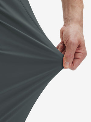 Detail view of pants elasticity on dark grey flat front golf joggers pants with belt loops