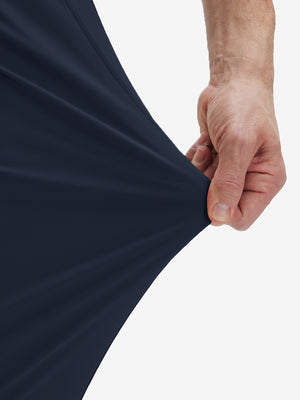 Detail view of pants elasticity on navy flat front golf joggers pants with belt loops