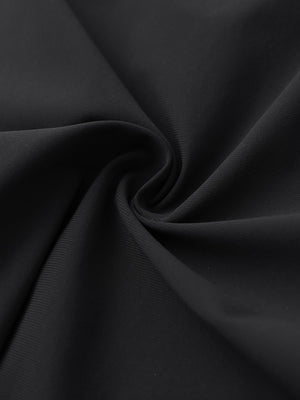 Close-up of quick dry casual shorts with 4 pockets fabric, breathable black texture with smooth finish