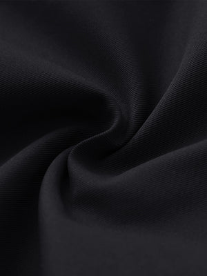 Close-up of fabric on water resistant versatile 8 pockets shorts, showing texture and finish in black.