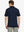Back half-body view of Chest Print Polo Shirts in Navy