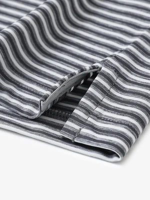 Close-up detail of hem opening on Sport Fit Stripe Polo in Dark Grey Stripe