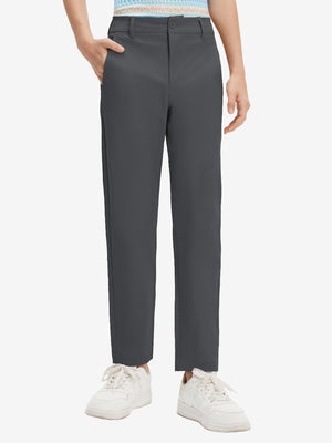 Front lower body shot of model wearing the dark grey youth water resistant cotton blend golf pants, showcasing a relaxed fit