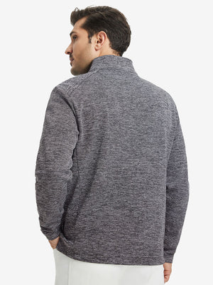 Back upper body view of model wearing textured insulated winter jacket, smooth finish, black heather.