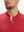 Close-up of model in red moisture-wicking short sleeve henley shirt, nose to chest view.