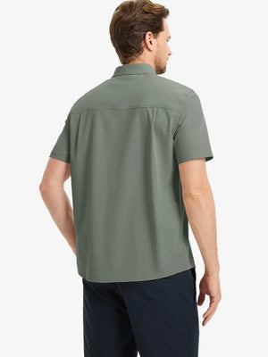 Half-body back view displaying the clean lines of the OLIVE GREEN polo.