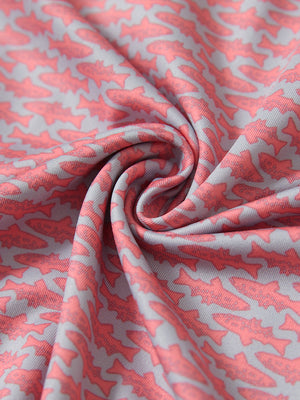 Close-up fabric detail of lightweight print long sleeve polo, breathable texture and soft feel in pink small fish