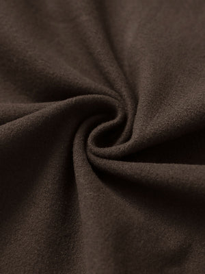 Fabric close-up of coffee brown women's water-resistant stretch fleece lined jacket, soft stretch fabric with fleece lining.
