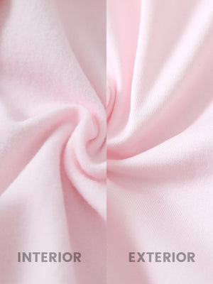 Close-up of fleece-lined fabric on women's lightweight puffer jacket, showing texture in light pink.